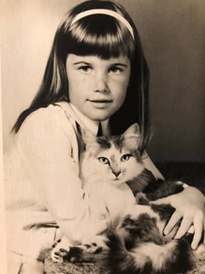 Young Susan Satori with kitty, Caroline
